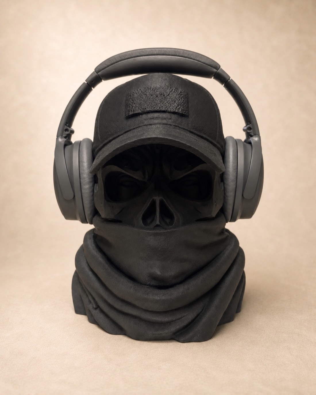 Black tactical skull headphone stand with cap and neck gaiter